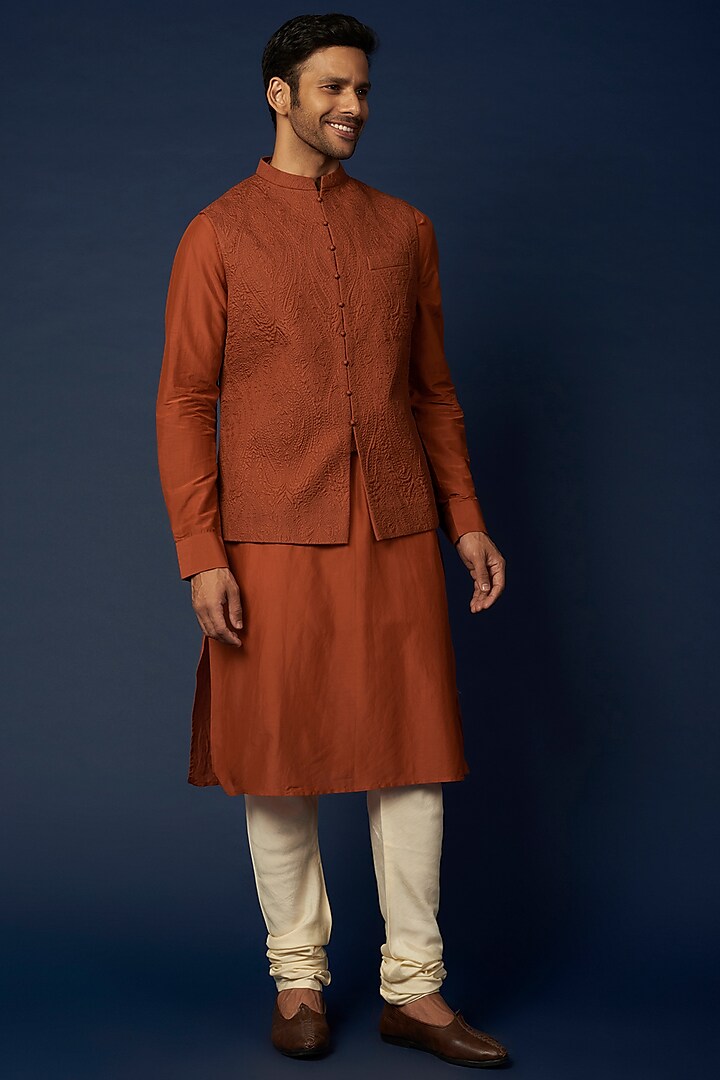 Burnt Orange Silk Bundi Jacket With Kurta Set by Khanijo