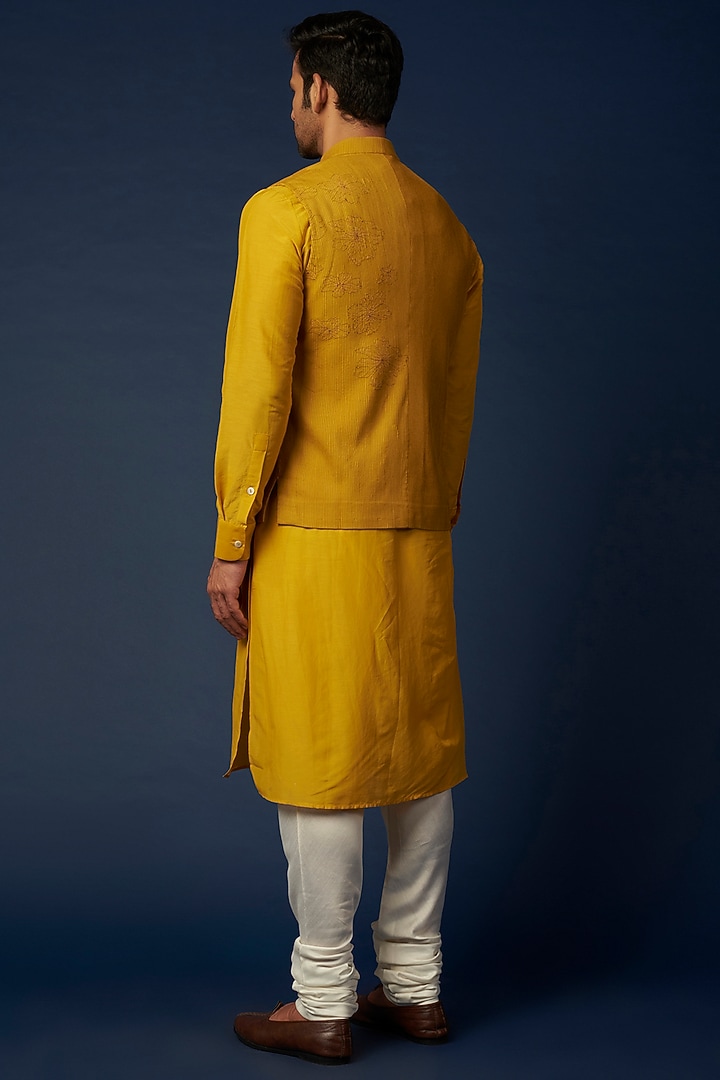 Mustard Embroidered Bundi Jacket With Kurta Set by Khanijo at Pernia's Pop Up Shop