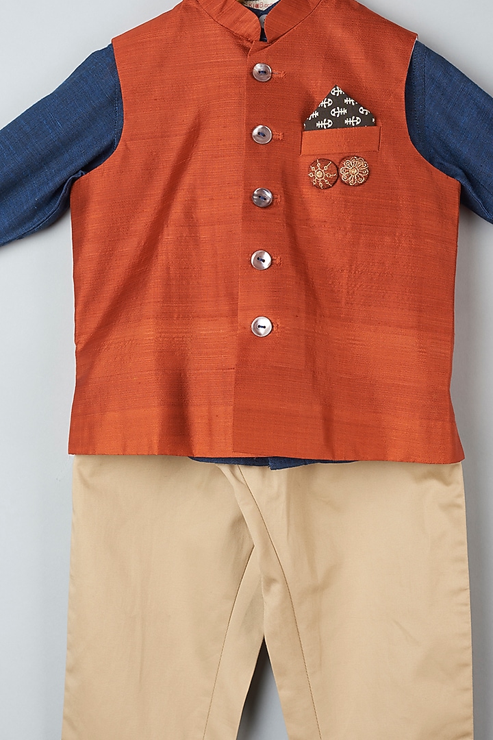 Rust Silk Bundi Jacket With Pant Set For Boys by Khela at Pernia's Pop Up Shop