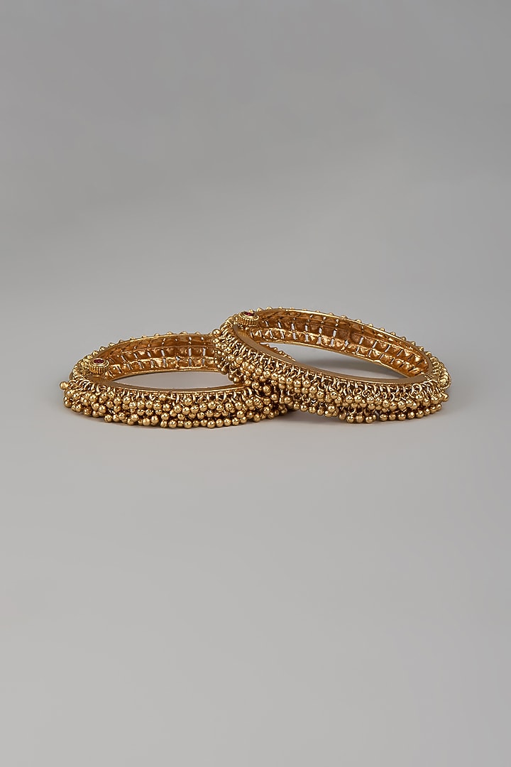 Gold Finish Temple Bangle (Set Of 2) by Khushi Jewels at Pernia's Pop Up Shop