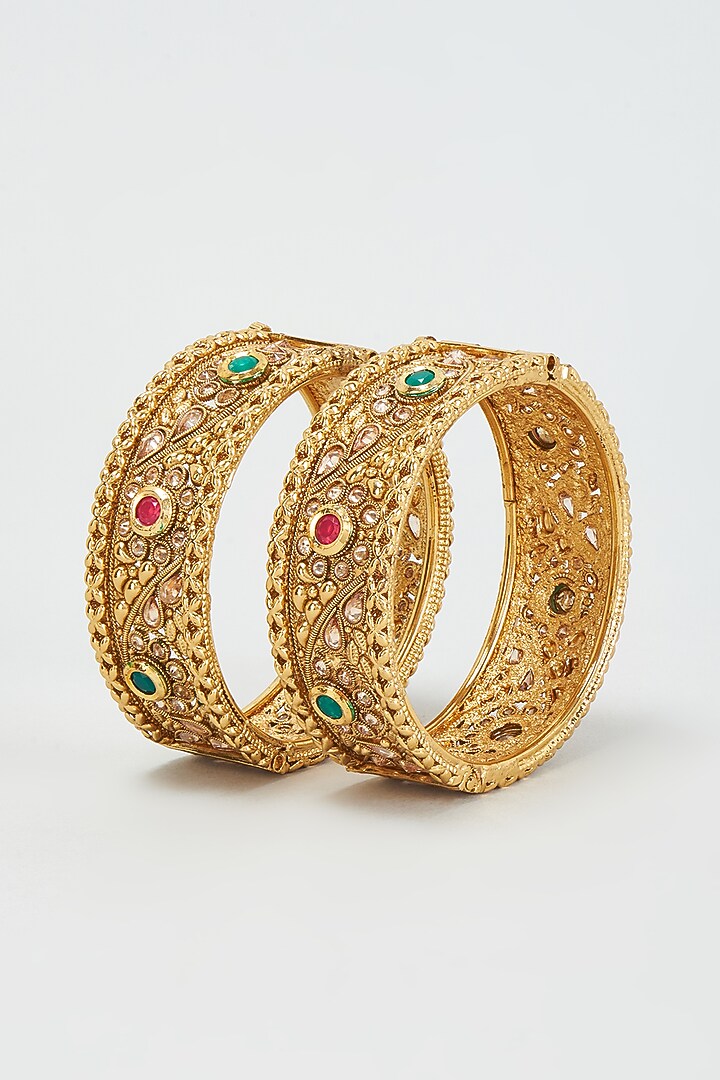 Gold Finish Red & Green Stone Bangles (Set Of 2) by Khushi Jewels at Pernia's Pop Up Shop