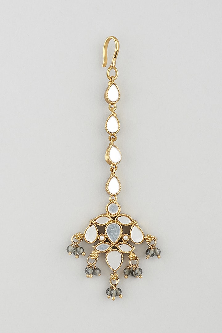 Gold Finish Light Grey Stone White Enamelled Jhumka Earrings With Mangtikka by Khushi Jewels