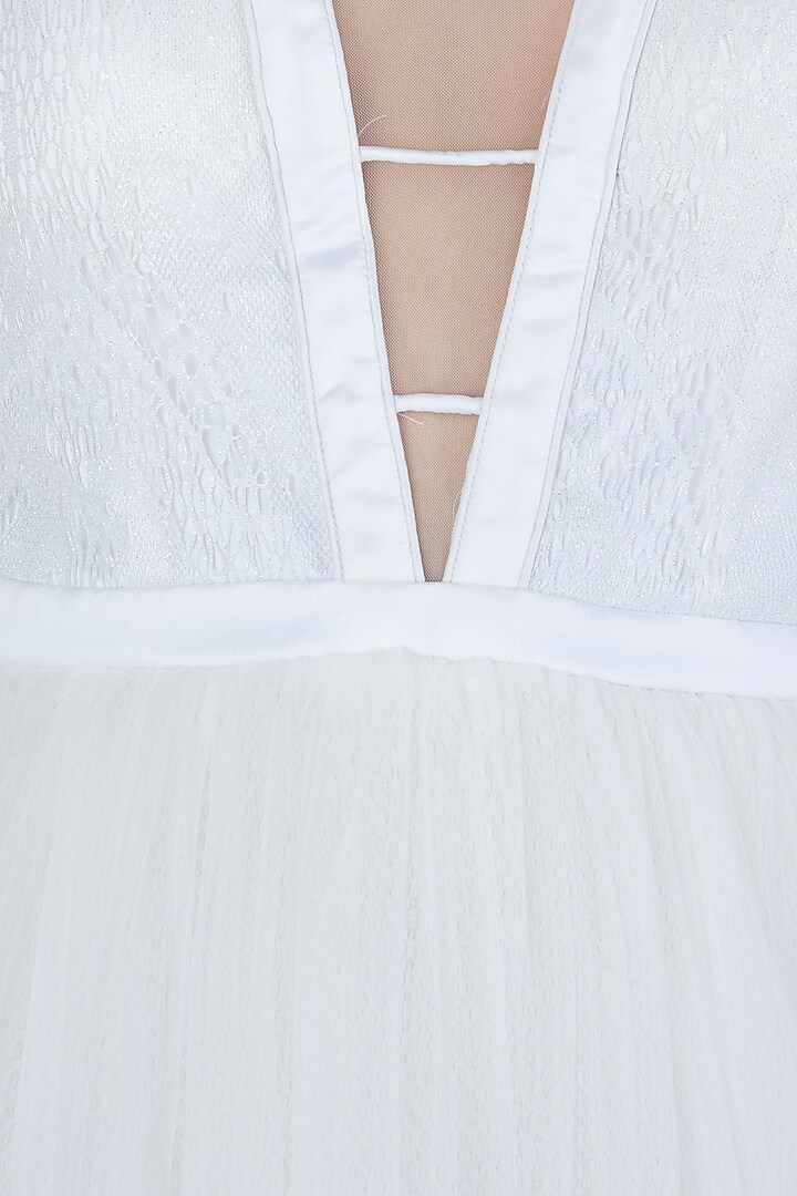 White strappy dress available only at Pernia's Pop Up Shop.