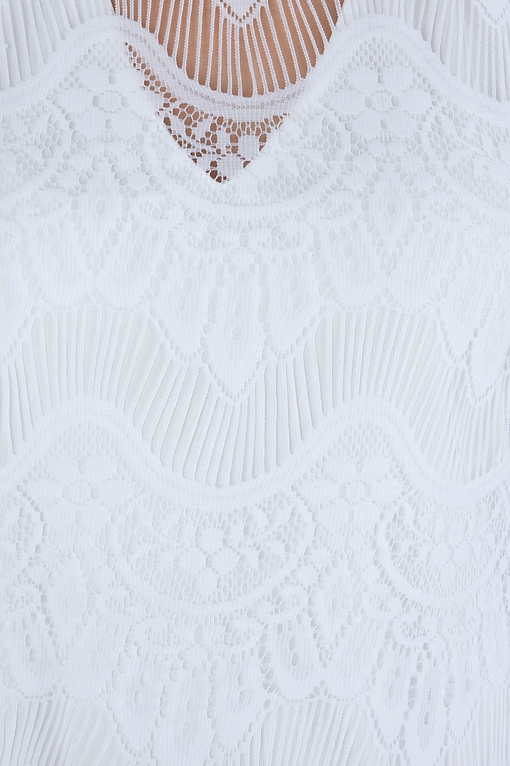 White kaftan dress available only at Pernia's Pop Up Shop.