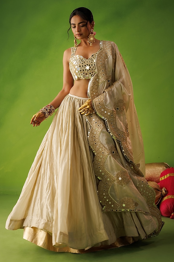 Beige Tissue Silk Mirror Embroidered Wedding Lehenga Set by Kisakshi Jaipur at Pernia's Pop Up Shop