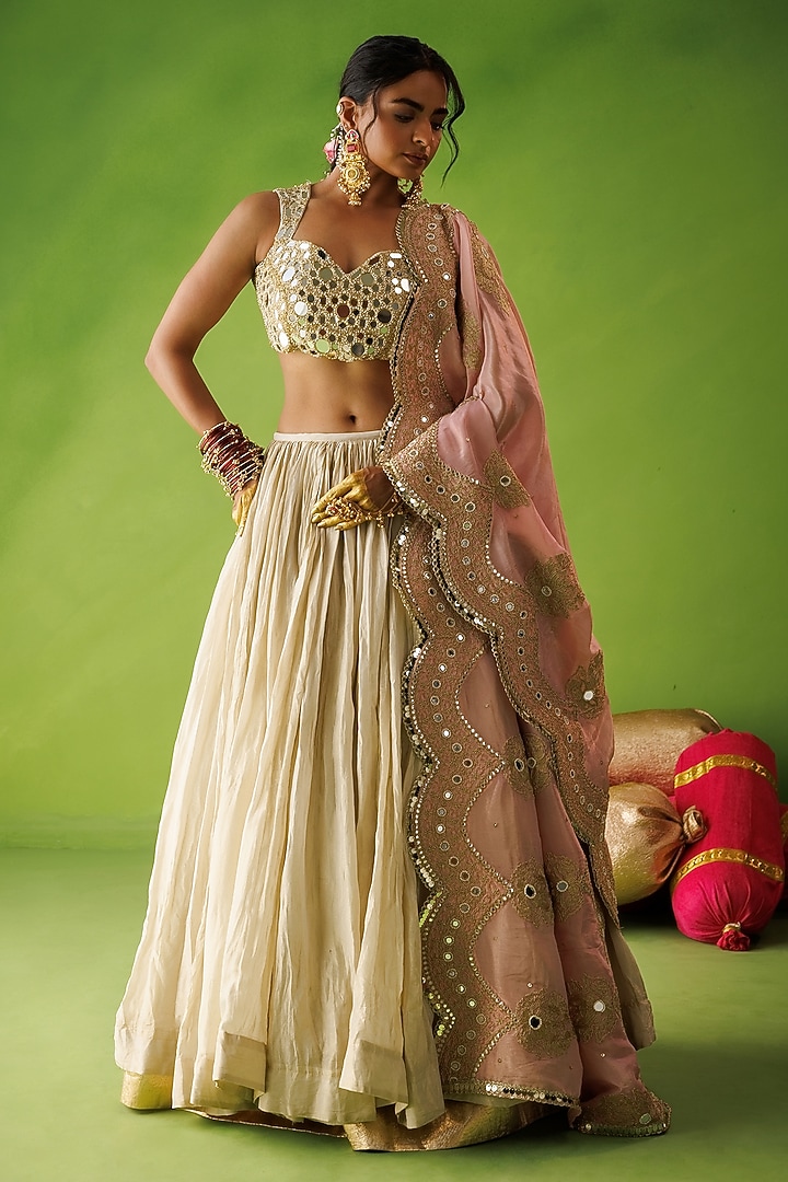 Beige Tissue Silk Mirror Embroidered Wedding Lehenga Set by Kisakshi Jaipur at Pernia's Pop Up Shop