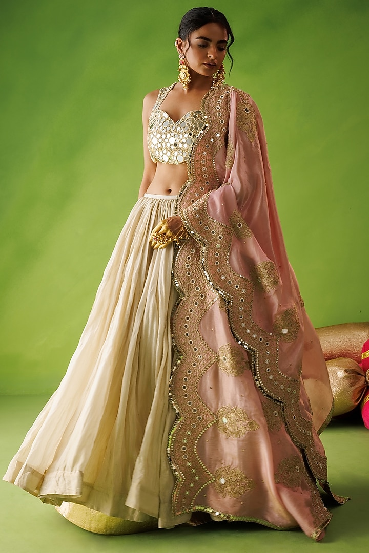 Beige Tissue Silk Mirror Embroidered Wedding Lehenga Set by Kisakshi Jaipur at Pernia's Pop Up Shop