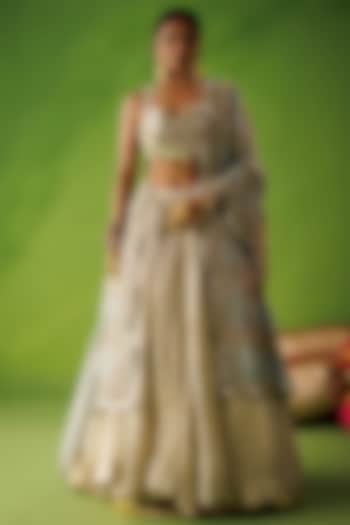Beige Tissue Silk Mirror Embroidered Wedding Lehenga Set by Kisakshi Jaipur at Pernia's Pop Up Shop