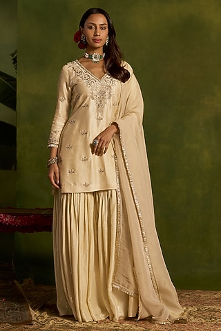 Ivory Silk Sequins Embroidered Gharara Set by Kritika Dawar