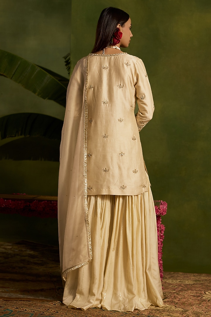 Ivory Silk Sequins Embroidered Gharara Set by Kritika Dawar at Pernia's Pop Up Shop