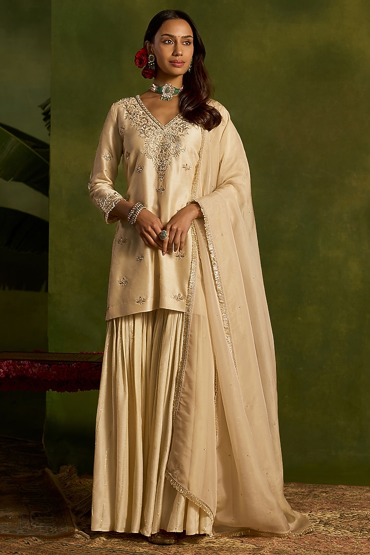 Ivory Silk Sequins Embroidered Gharara Set by Kritika Dawar at Pernia's Pop Up Shop