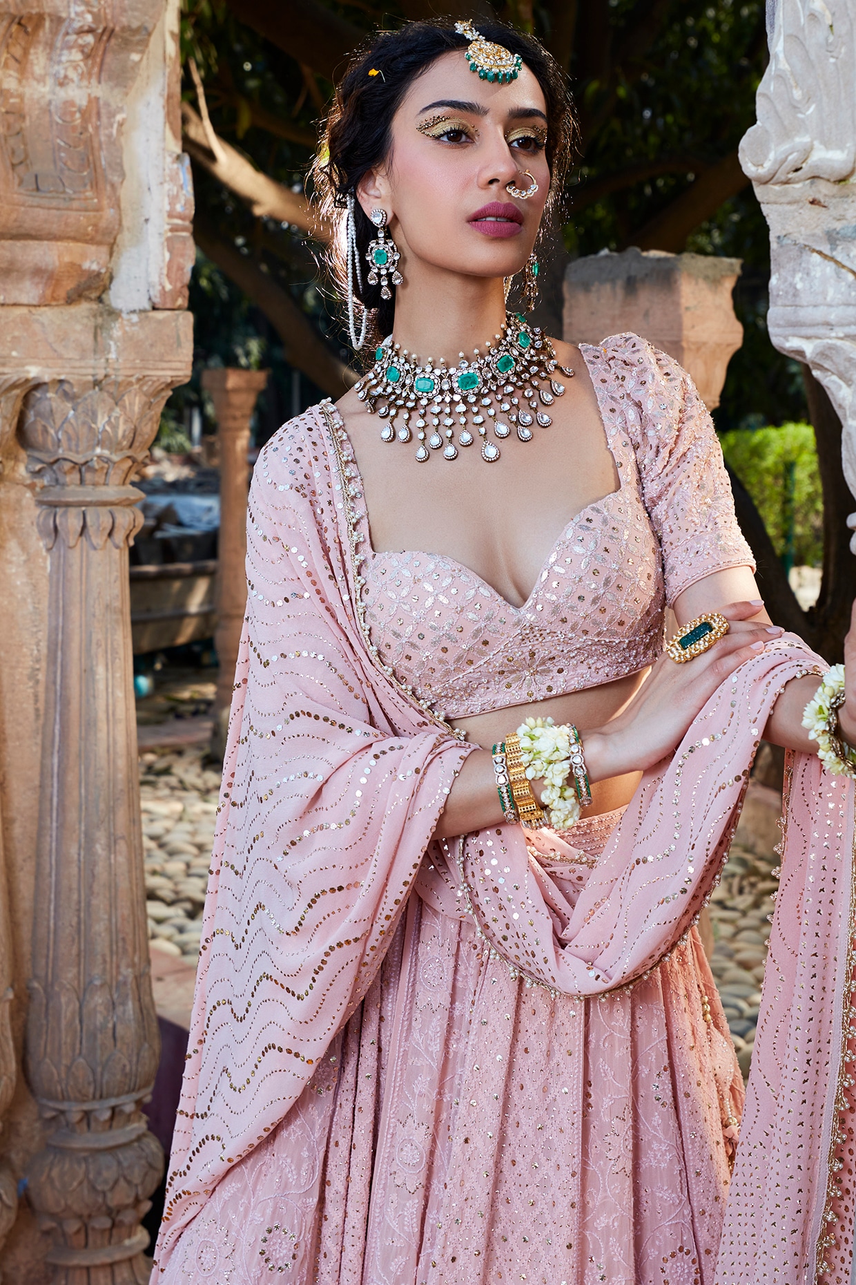 Baby pink bridal lehenga with green emeralds. See more on wedmegood.com  #wedmegood #indianwedding #in… | Indian bridal, Bridal jewellery indian,  Indian bridal dress