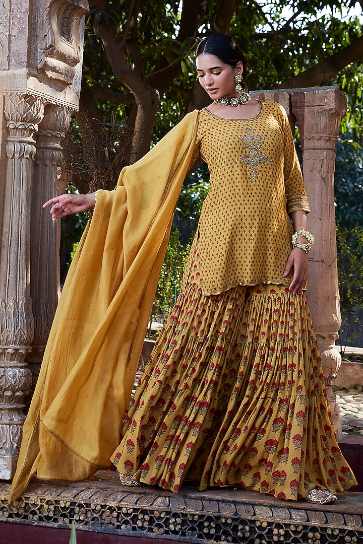 Yellow Silk Mulmul Printed Tiered Gharara Set by Kritika Dawar at Pernia's Pop Up Shop