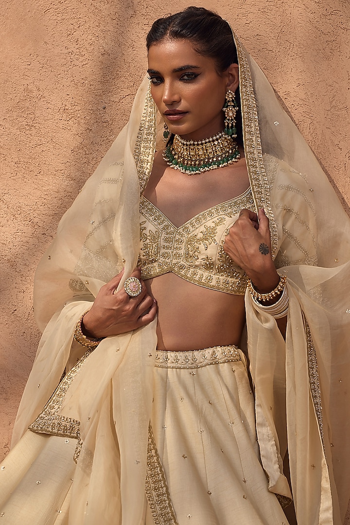 Ivory Silk Hand Embroidered Bridal Lehenga Set by Kritika Dawar at Pernia's Pop Up Shop