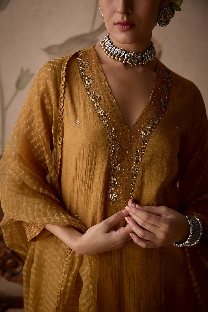 Mustard Tissue Sequins Embroidered Kurta Set by Kritika Dawar at Pernia's Pop Up Shop