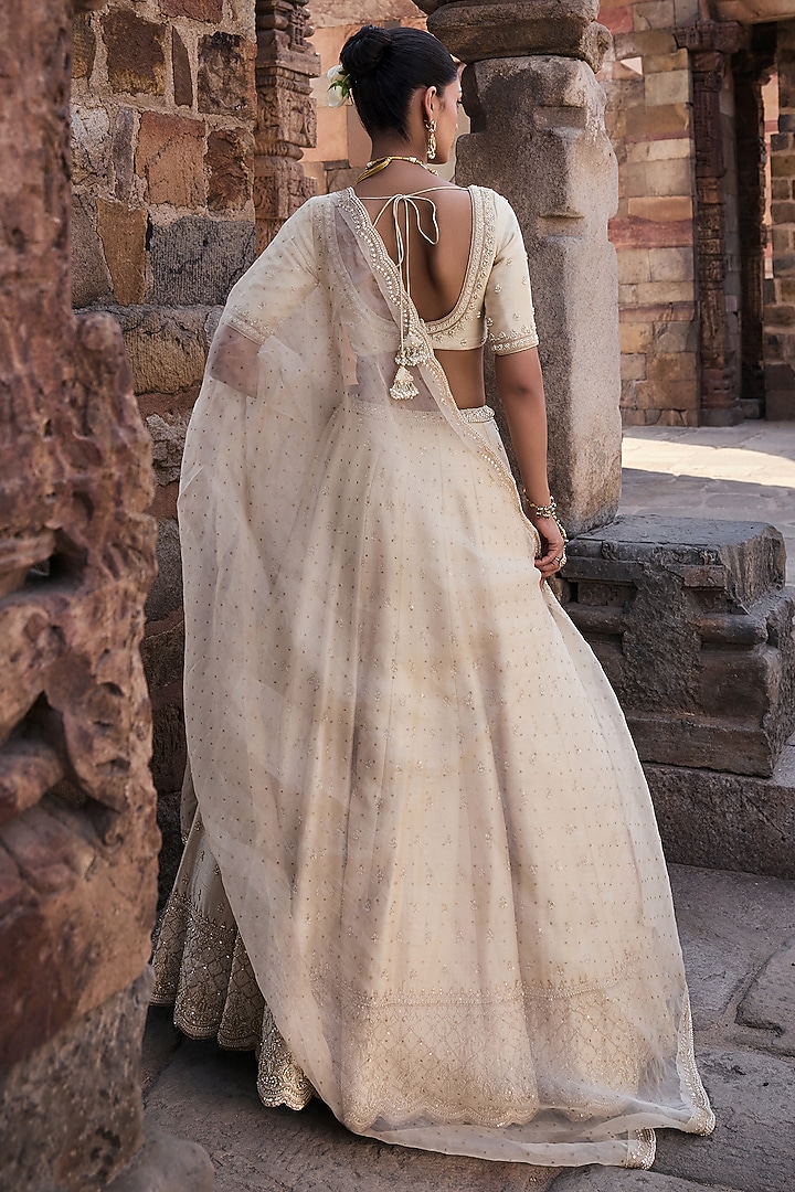 Ivory Silk Hand Embroidered Bridal Lehenga Set by Kritika Dawar at Pernia's Pop Up Shop