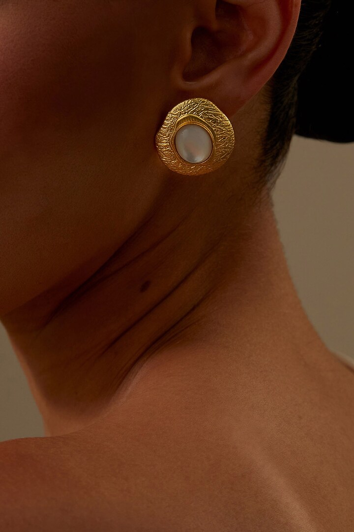 Gold Plated Shell Pearl Stud Earrings by KIVAAKSHH at Pernia's Pop Up Shop