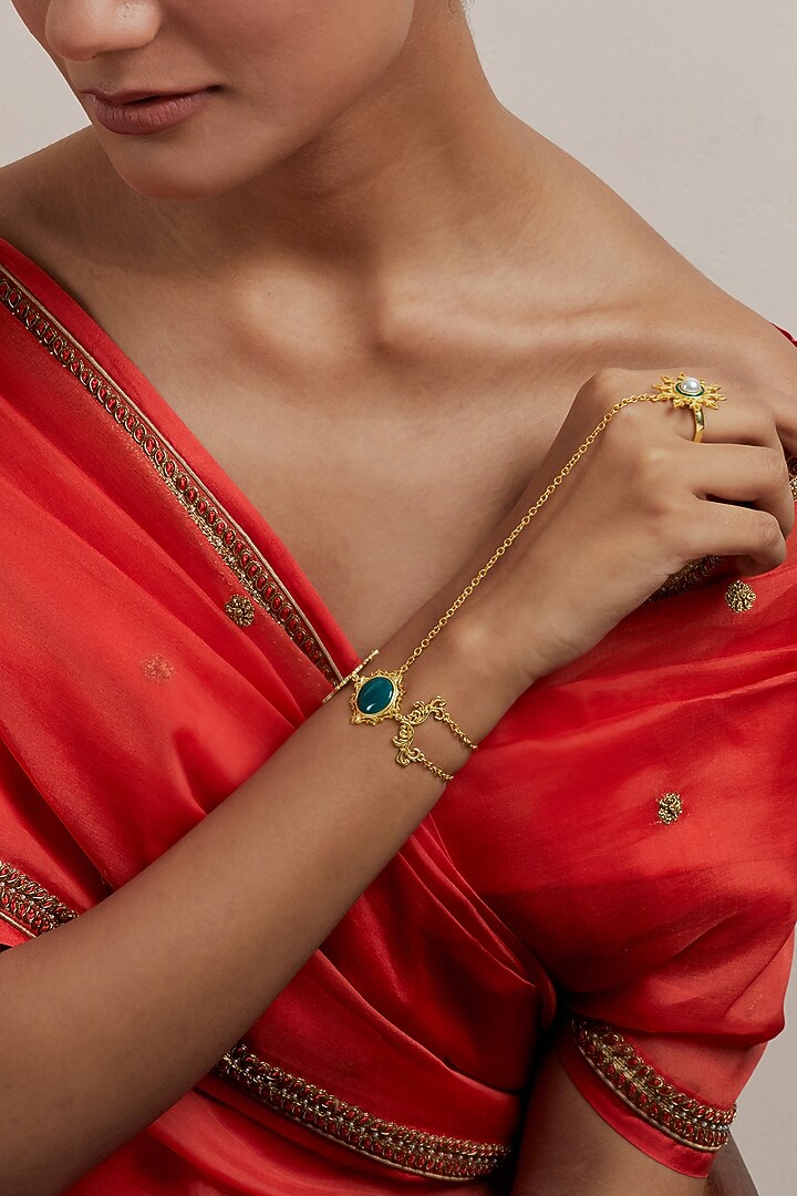 Gold Plated Pearl & Synthetic Emerald Stone Enamelled Haathphool by KIVAAKSHH at Pernia's Pop Up Shop