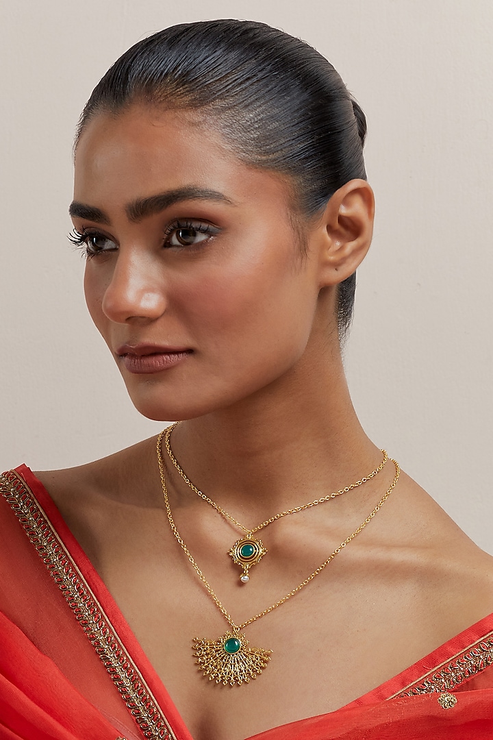 Gold Plated Pearl & Synthetic Emerald Stone Enamelled Necklace by KIVAAKSHH