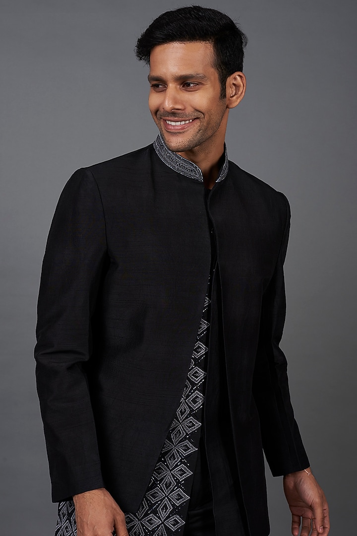 Black Silk Resham Embroidered Asymmetric Wedding Indowestern Set by KSHITIJ CHOUDHARY MEN at Pernia's Pop Up Shop
