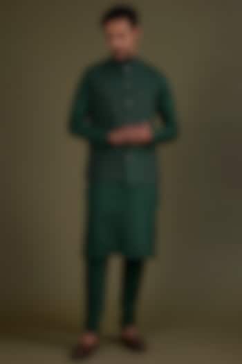 Bottle Green Embroidered Bundi Jacket With Kurta Set by KSHITIJ CHOUDHARY MEN