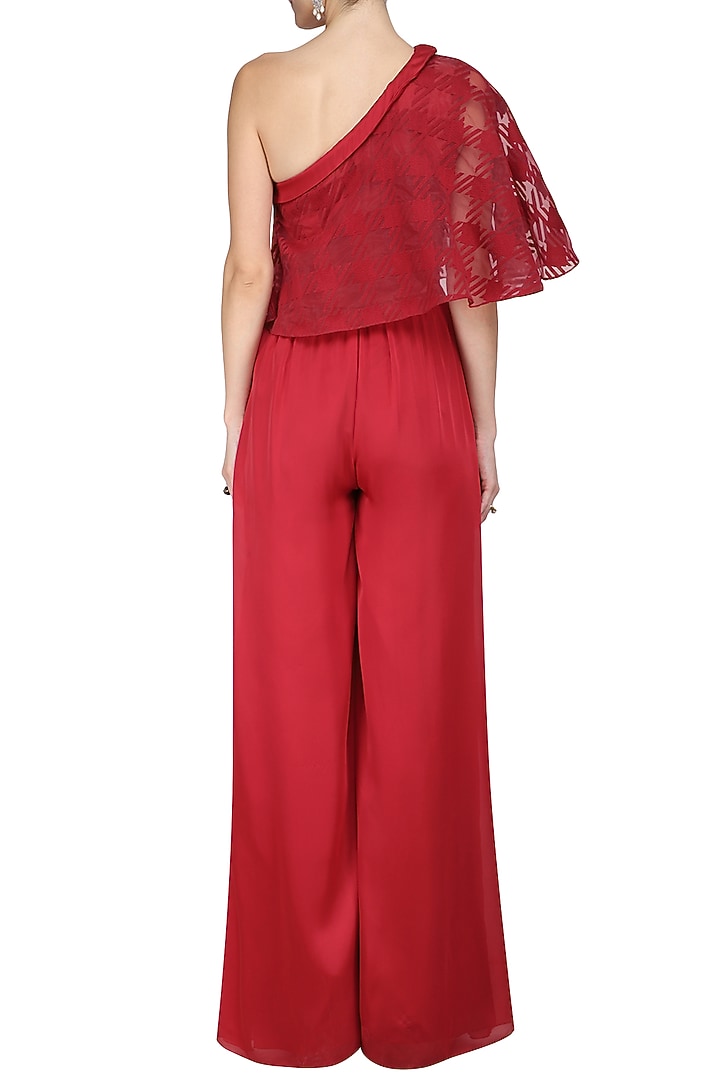 Red one shoulder cape jumpsuit available only at Pernia's Pop Up Shop.