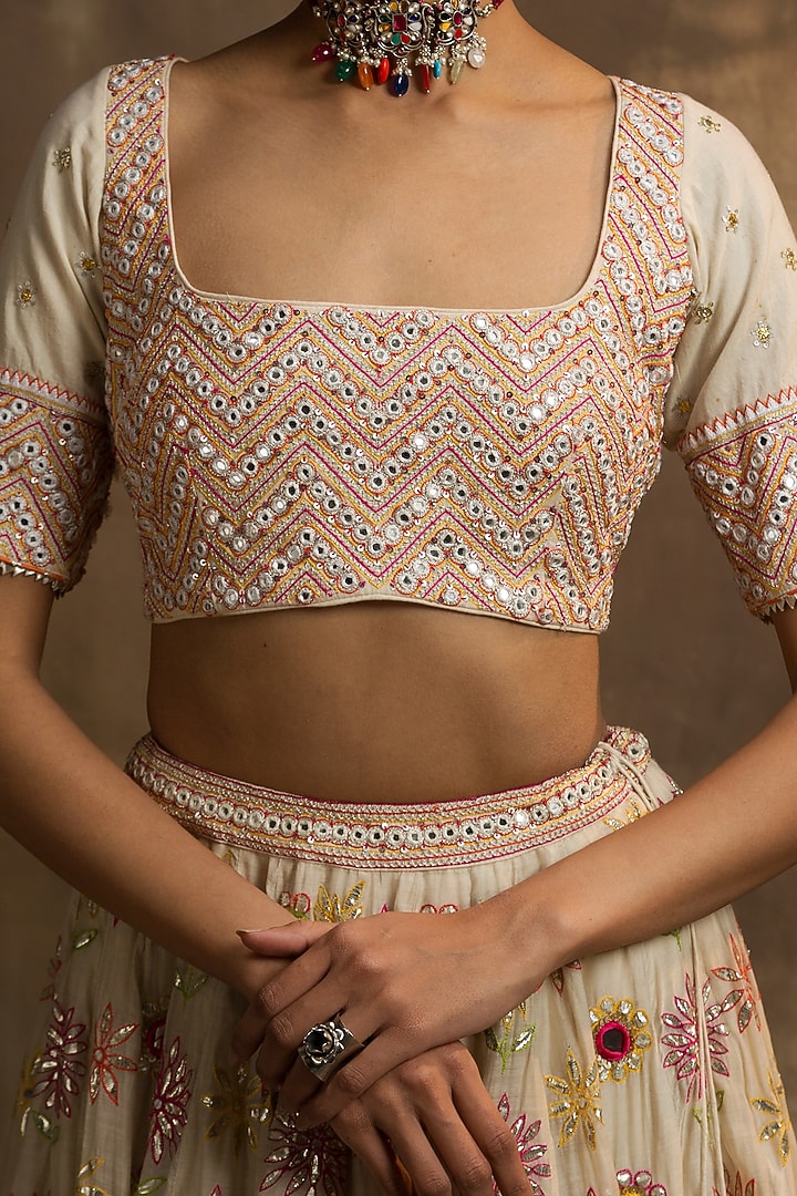 Cream Bridal Lehenga Set With Embroidered Blouse by Karishma Khanduja Bareilley at Pernia's Pop Up Shop