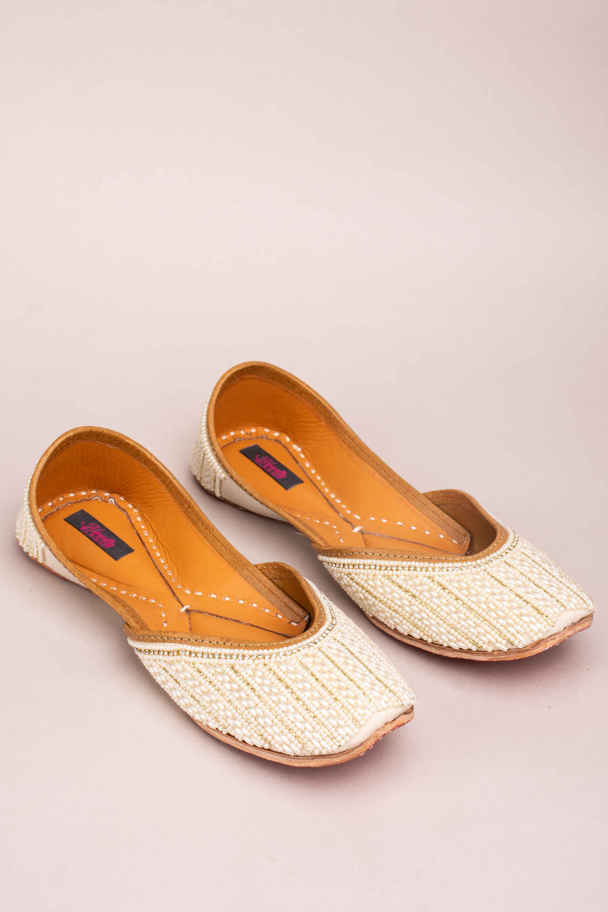 Ivory Leather Handcrafted Juttis by Kasually Klassy at Pernia's Pop Up Shop