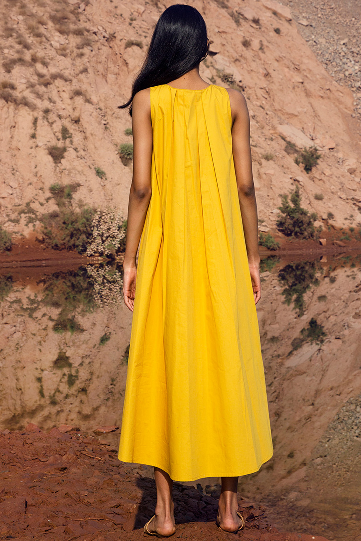 Yellow pleated midi dress top