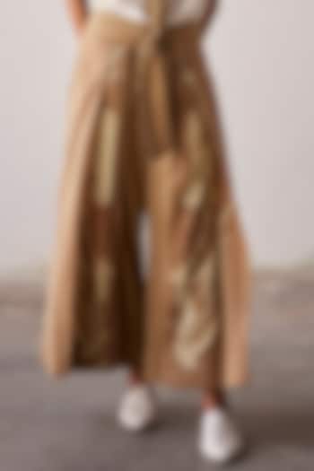 Camel Brown Mul Cotton Flared Pleated Trousers by Khara Kapas