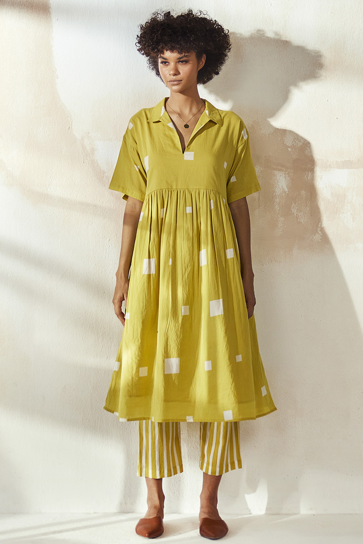 White & Yellow Mulmul Tunic Set by Khara Kapas at Pernia's Pop Up Shop