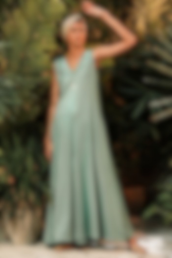 Turquoise Flared Jumpsuit by Khara Kapas at Pernia's Pop Up Shop