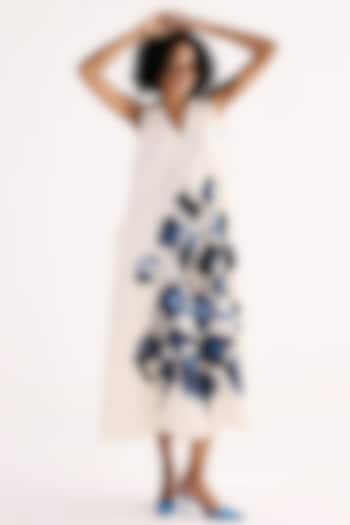 Off-White & Ink Blue Cotton Mul Floral Printed A-line Jumpsuit by Khara Kapas at Pernia's Pop Up Shop