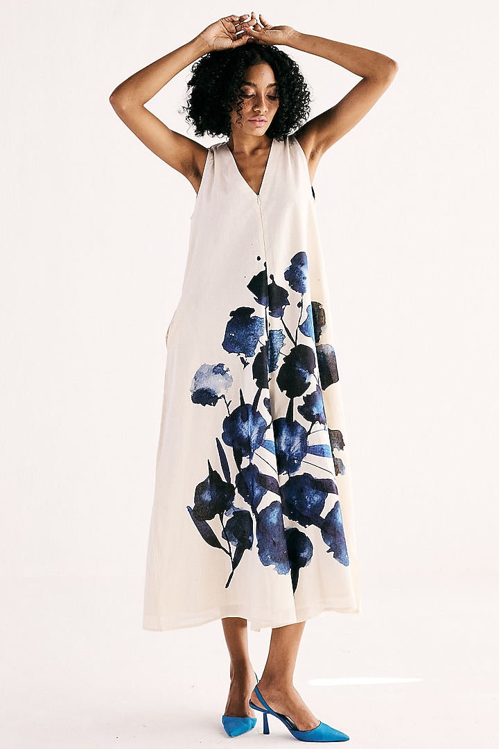 Off-White & Ink Blue Cotton Mul Floral Printed A-line Jumpsuit by Khara Kapas at Pernia's Pop Up Shop