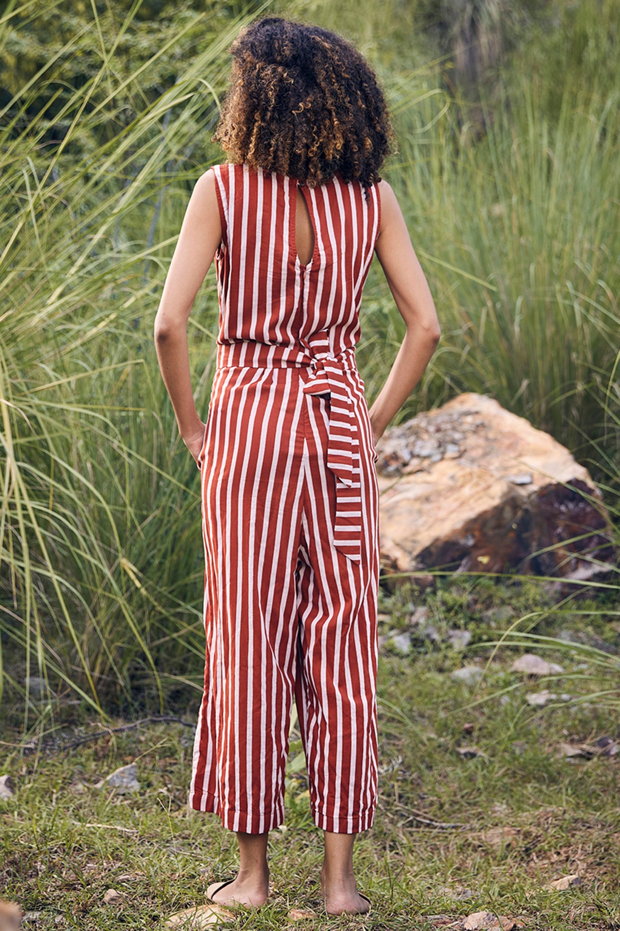 Brick Red Off White Striped Printed Jumpsuit by Khara Kapas at Pernia s Pop Up Shop