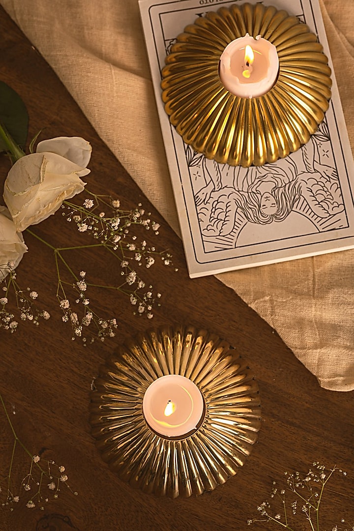 Oval Brass Candle Holder & Round Candle Holder by Kaksh studio