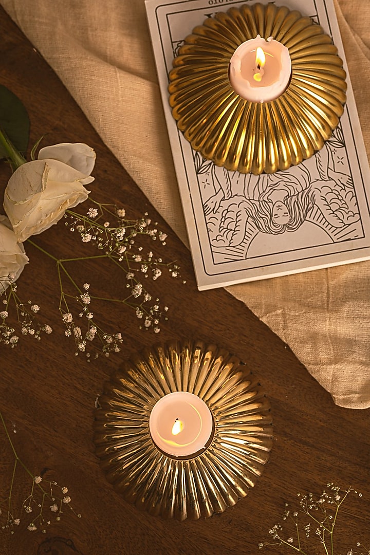 Oval Brass Candle Holder & Round Candle Holder by Kaksh studio at Pernia's Pop Up Shop