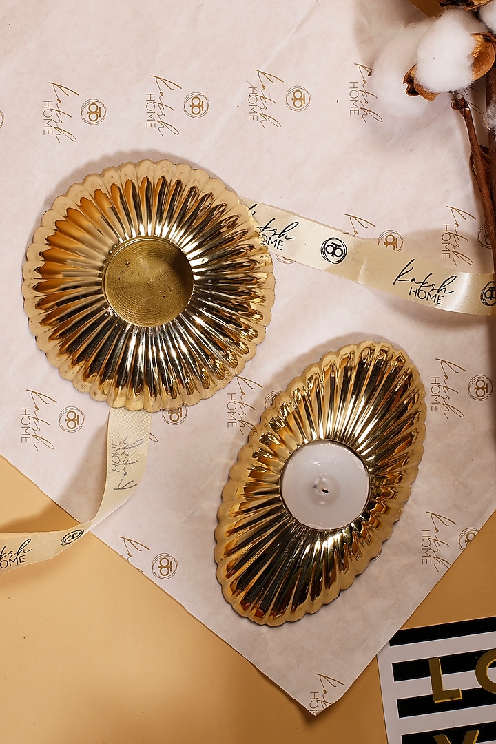 Oval Brass Candle Holder & Round Candle Holder by Kaksh studio at Pernia's Pop Up Shop