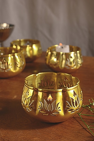 Gold Aluminium Candle Holders by Kaksh studio