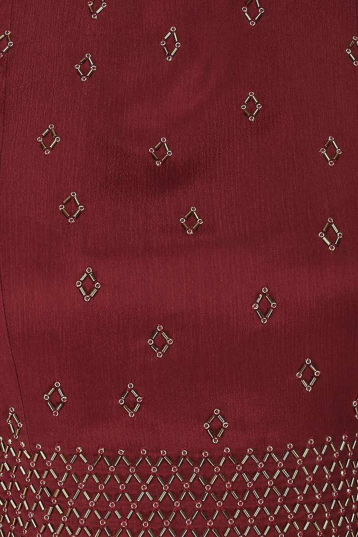 Maroon embroidered crop top with flared skirt available only at Pernia's Pop Up Shop.