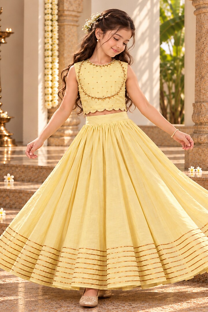Yellow Chanderi Cotton Silk Dabka Hand Embroidered Lehenga Set For Girls by Klistel at Pernia's Pop Up Shop