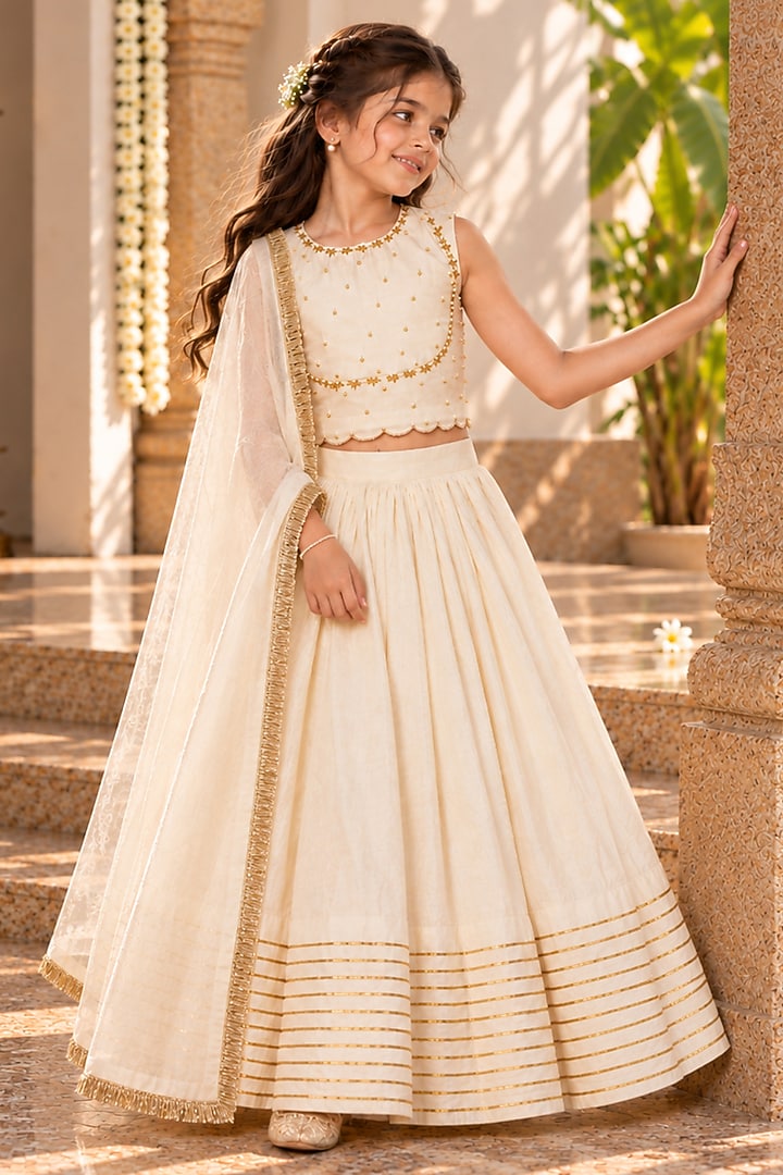 Ivory Chanderi Cotton Silk Dabka Hand Embroidered Lehenga Set For Girls by Klistel at Pernia's Pop Up Shop
