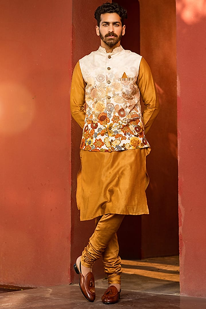 Mustard Kurta Set With Cream Bundi Jacket by Kalista Men