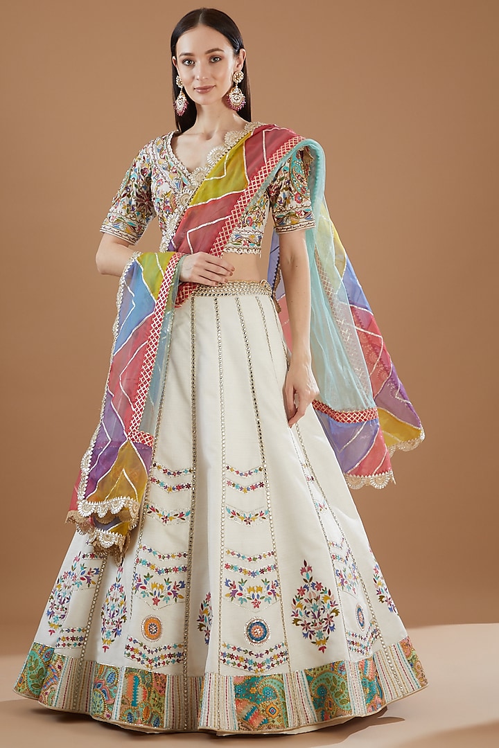 Ivory Silk Embroidered Lehenga Set by KM By Kavita