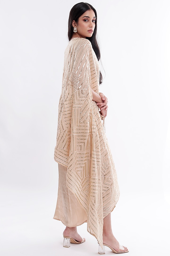 Gold Draped Vacation Dress With Cape by Komal Shah at Pernia's Pop Up Shop