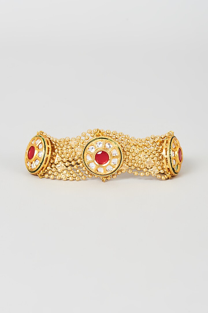Gold Plated Kundan Polki & Red Stone Jaal Bracelet by Just Shraddha