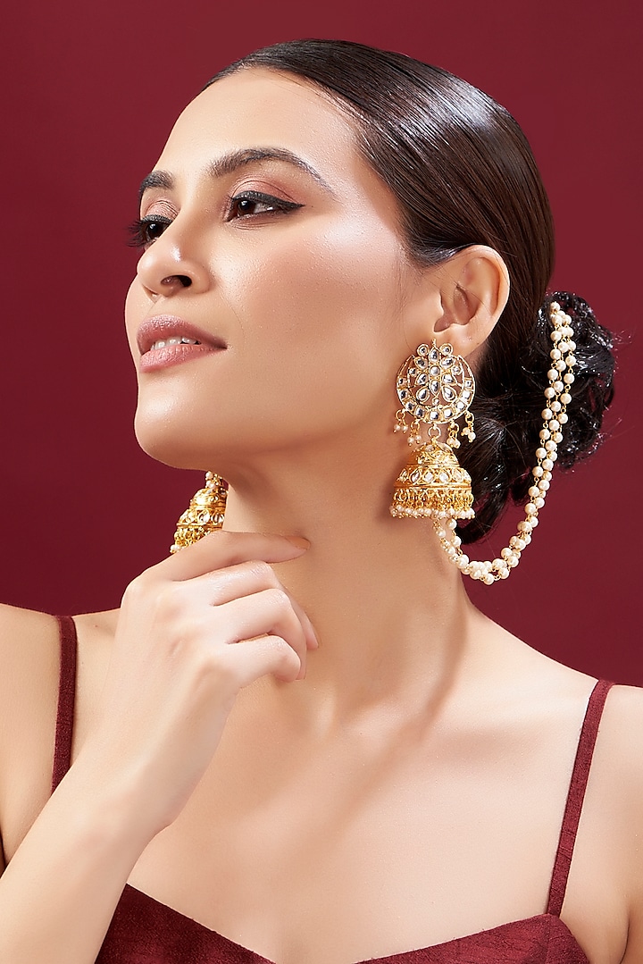 Gold Plated Pearl Tassel & White Stone Jhumka Earrings by Just Shraddha at Pernia's Pop Up Shop