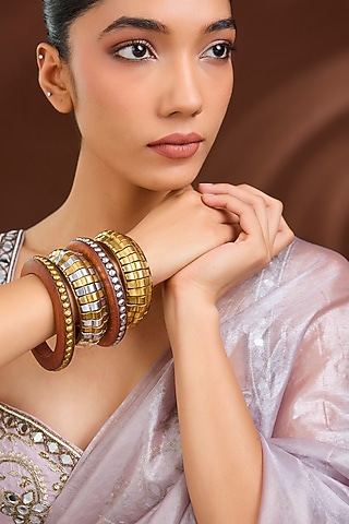 Oxidised Gold Finish Synthetic Stone Bangles (Set Of 4) by Just Shraddha