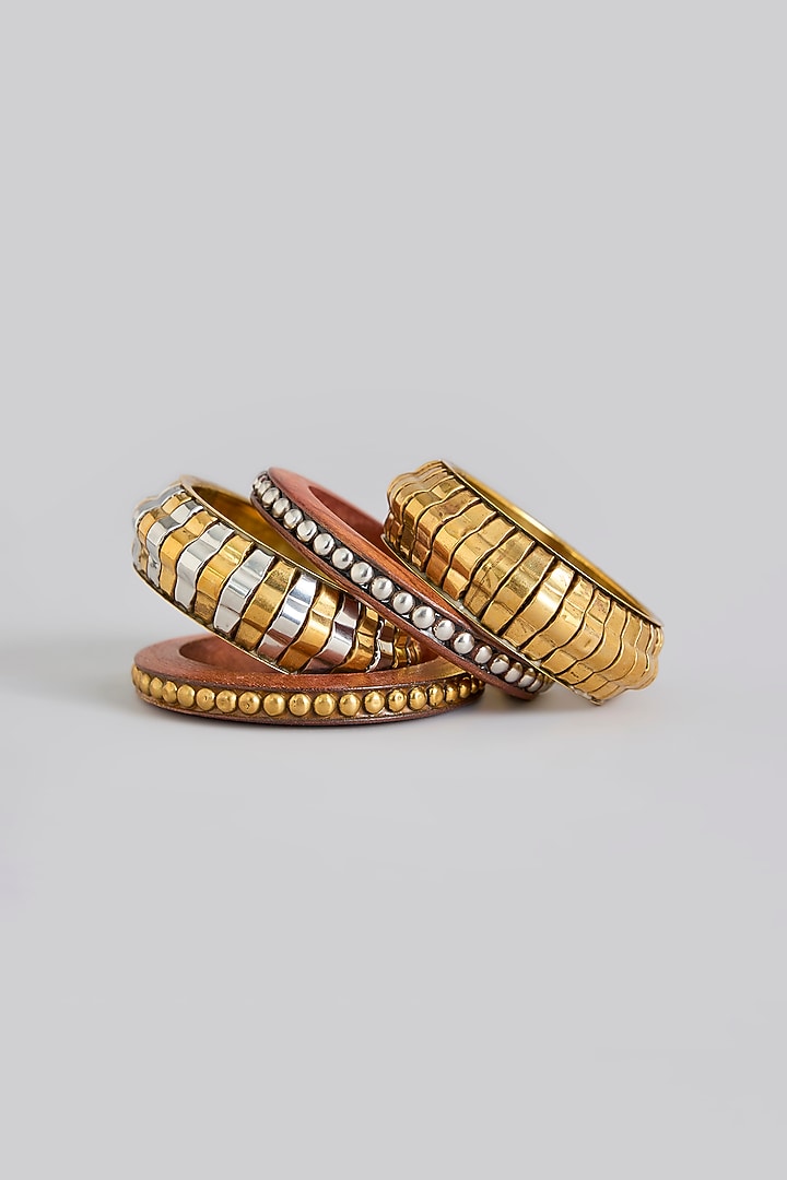 Oxidised Gold Finish Synthetic Stone Bangles (Set Of 4) by Just Shraddha at Pernia's Pop Up Shop