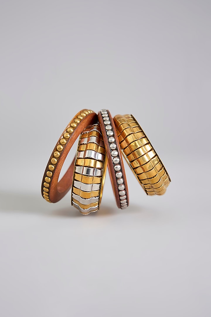 Oxidised Gold Finish Synthetic Stone Bangles (Set Of 4) by Just Shraddha at Pernia's Pop Up Shop